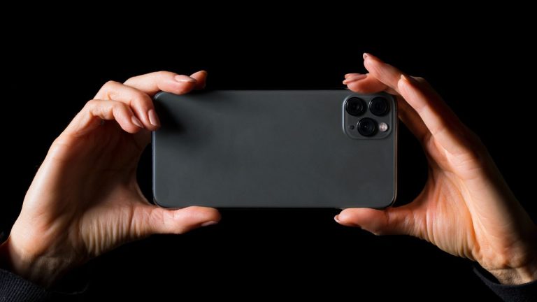 Hands holding Phone